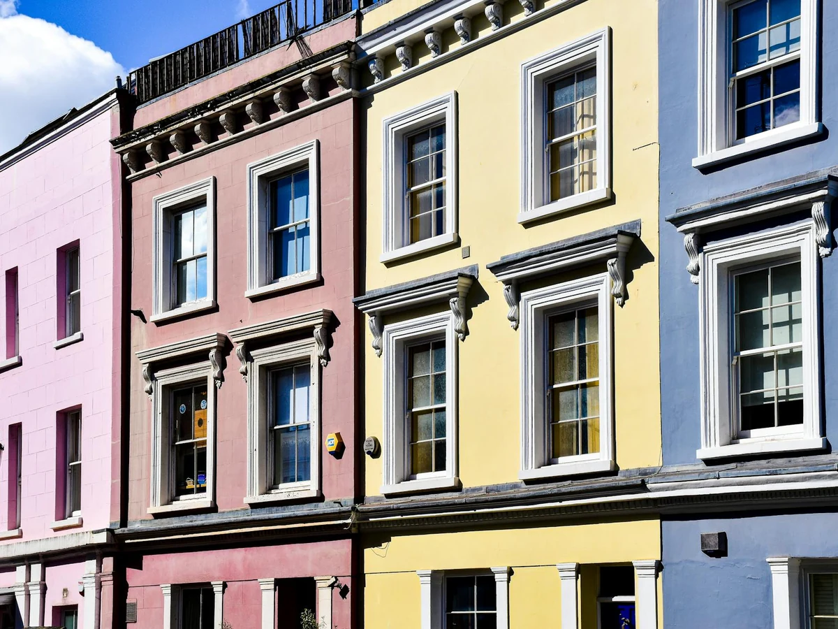 Colourful terraced house exterior painting in Chesterfield by Chesterfield Decorators