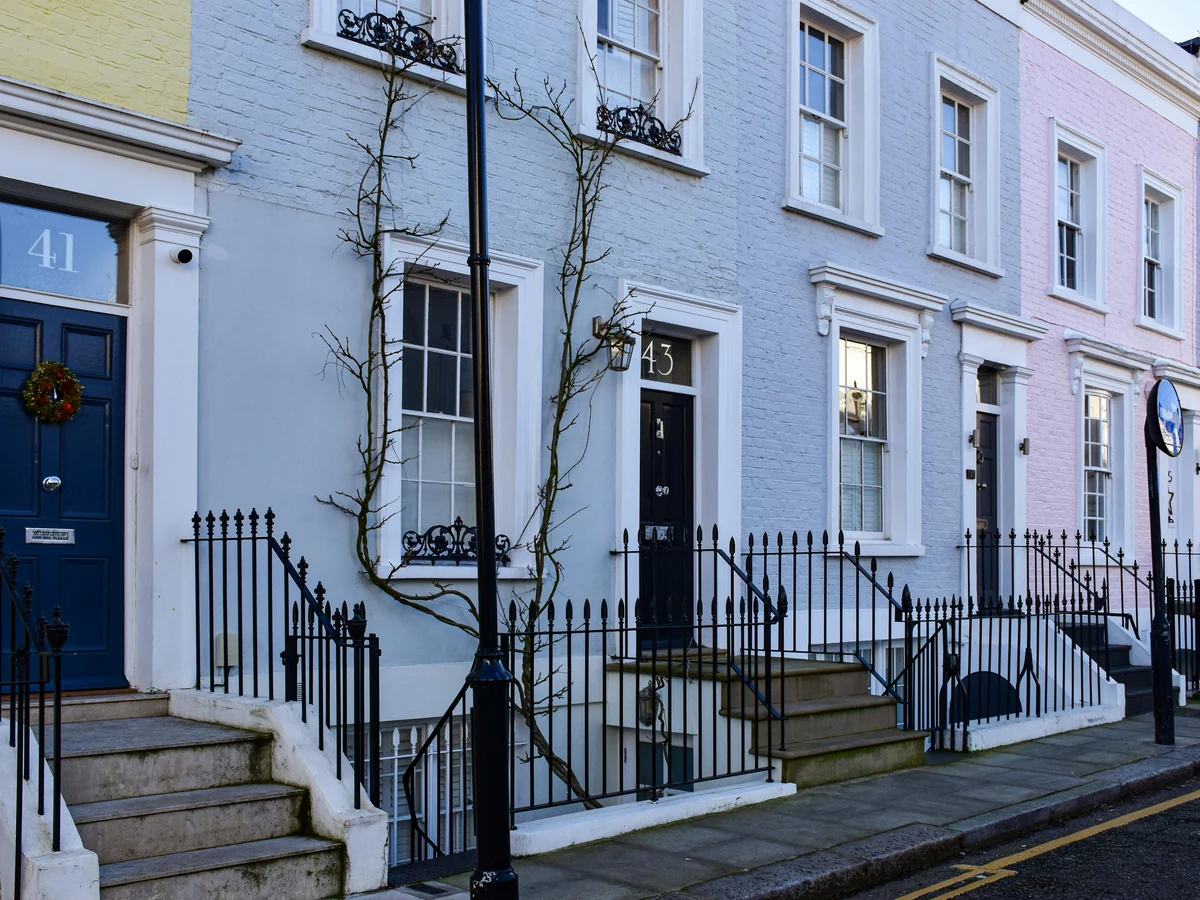Exterior painting of colourful Victorian terraced houses in Brampton by Chesterfield Decorators