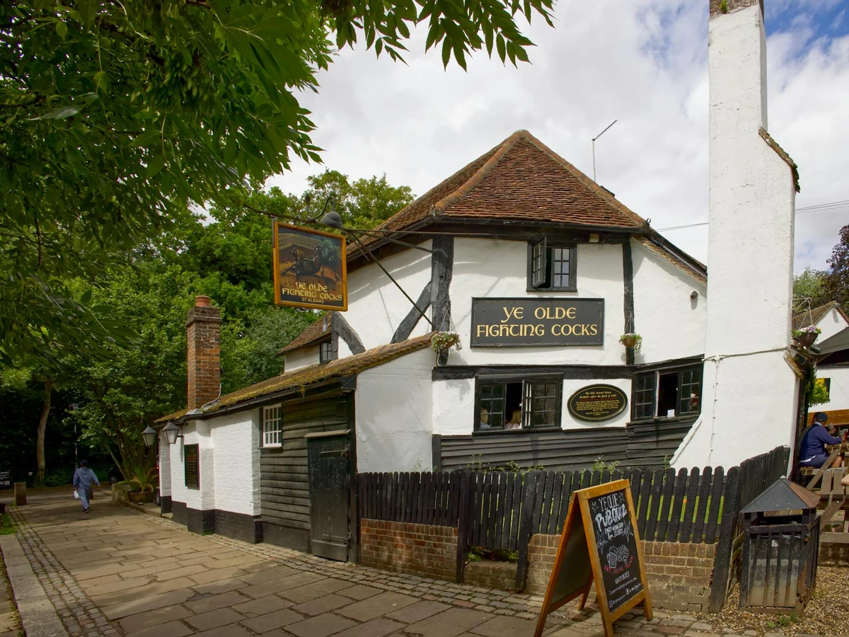 Exterior painting historic stone building by Chesterfield Decorators