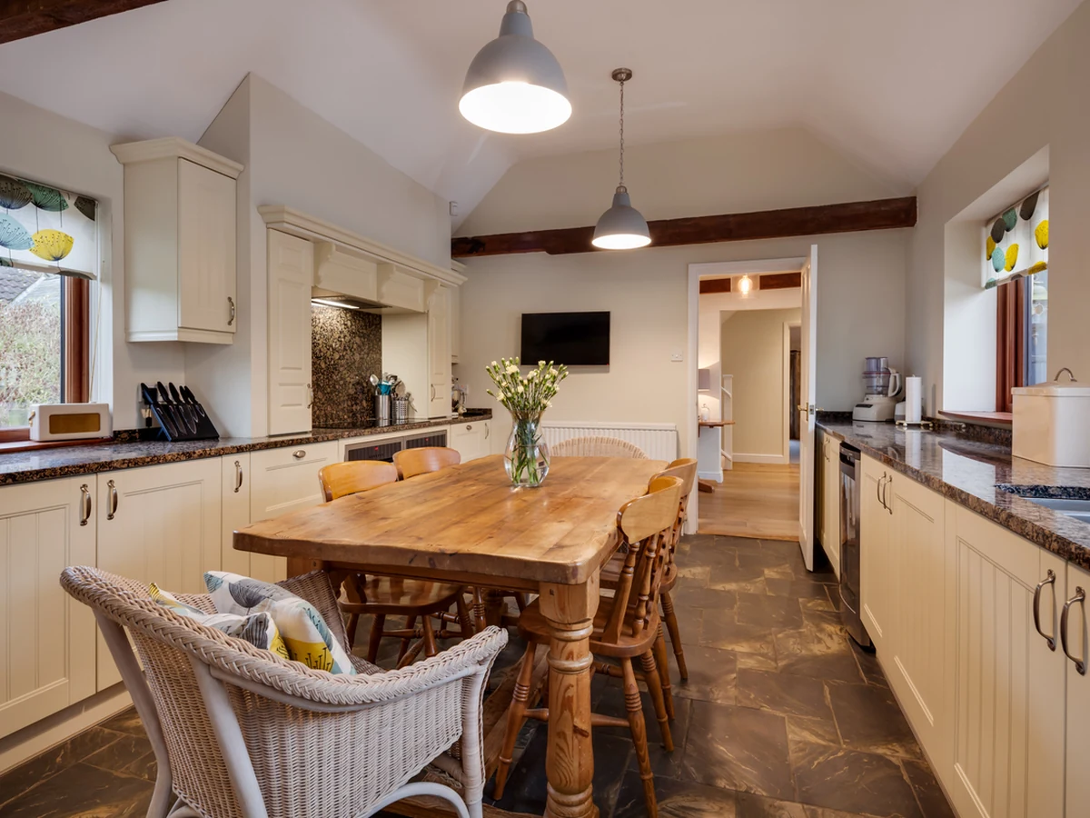 Country cream kitchen cabinet painting in Matlock by Chesterfield Decorators