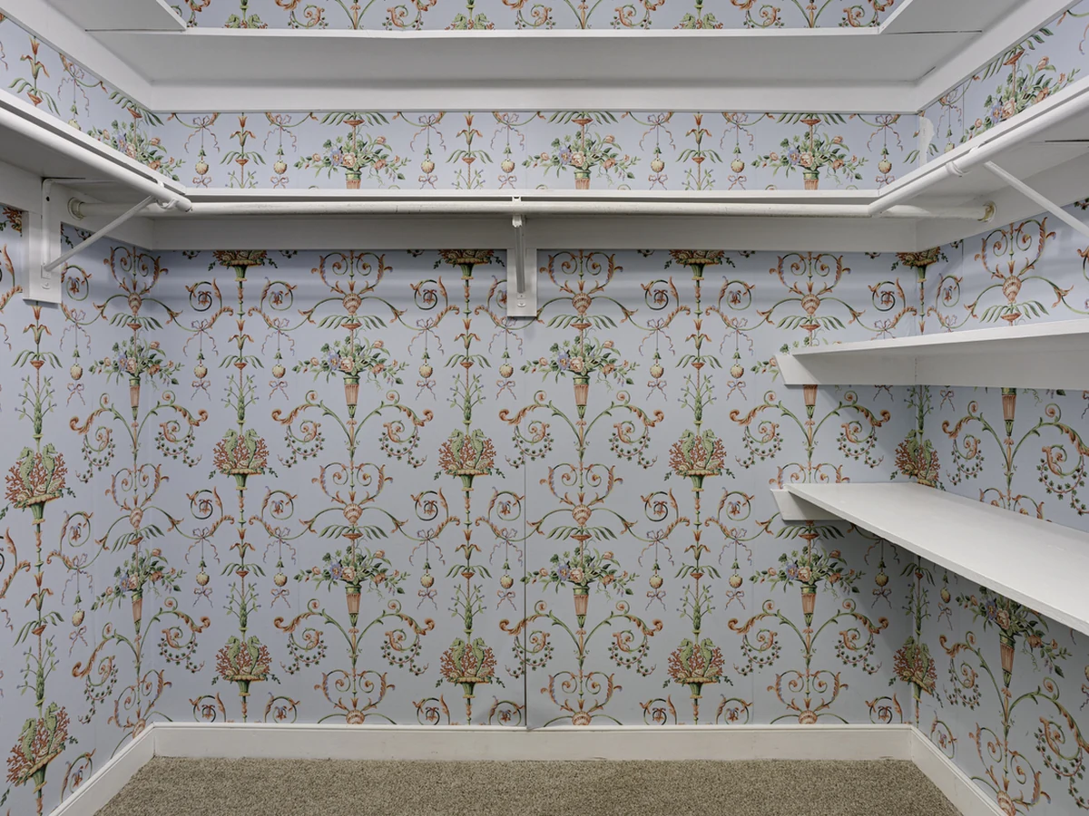 Fully wallpapered closet interior in Chesterfield by Chesterfield Decorators