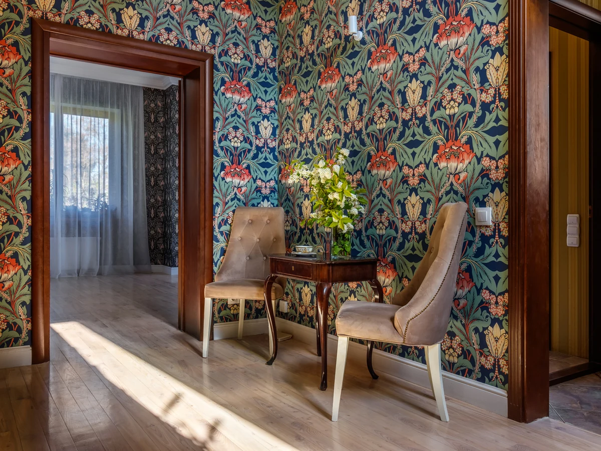 Wallpapering ornate floral wallpaper in Chesterfield by Chesterfield Decorators, professional wallpaper installers